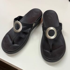 CROCS Black Sandals with Metallic Accents